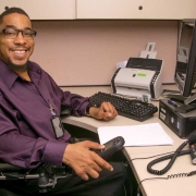 Man at desk using computer