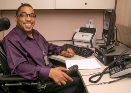 Man at desk using computer